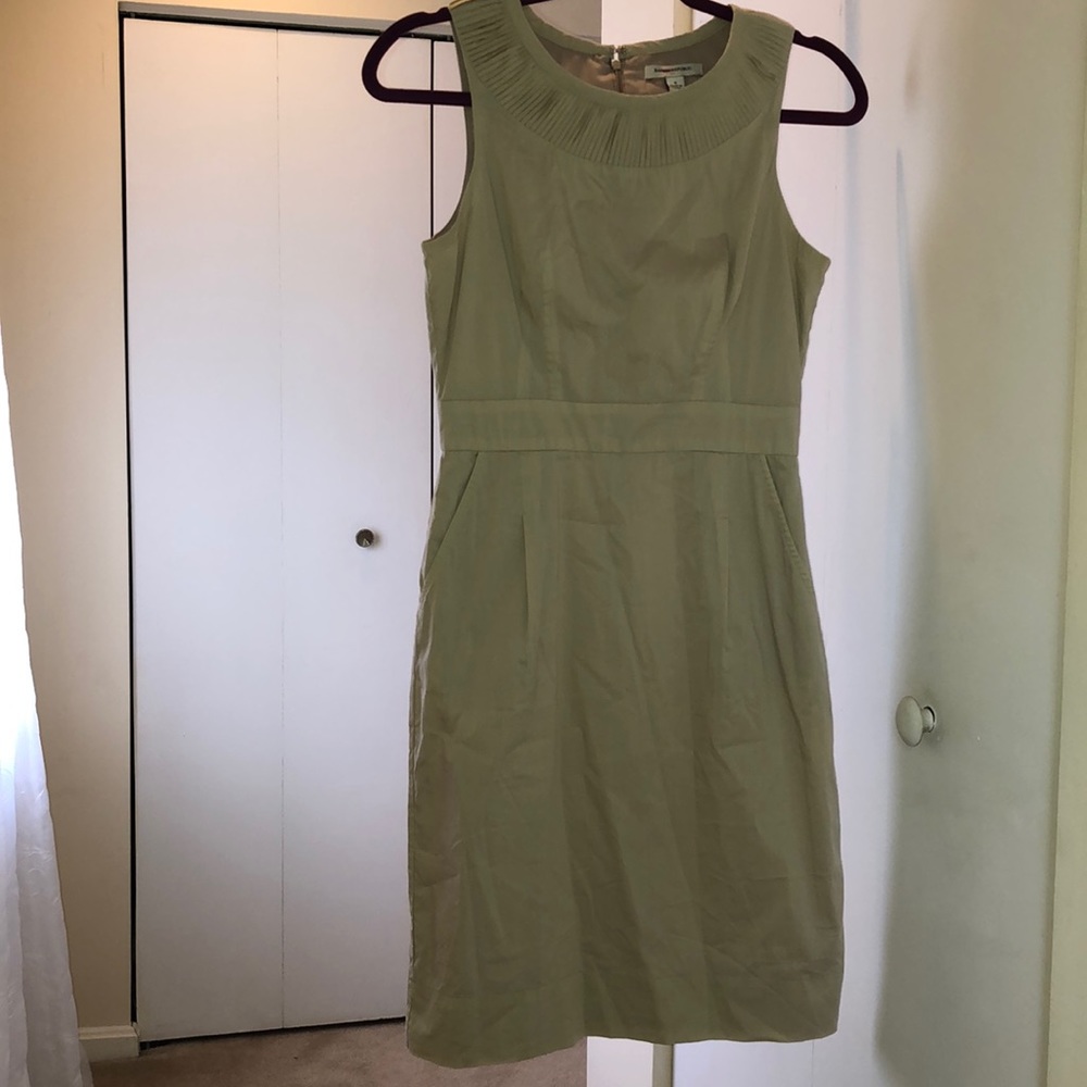 Khaki dress. Knee length. Short sleeves